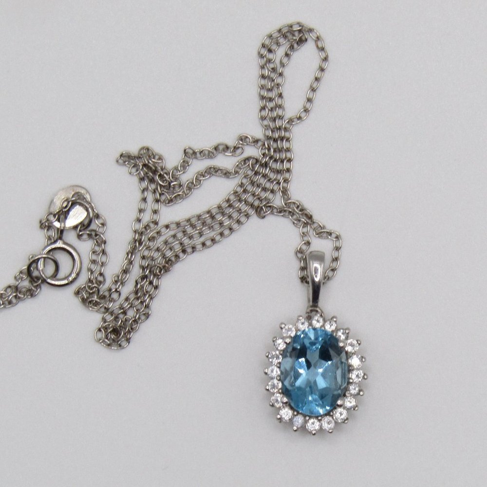 Delicate Sterling Silver Blue and White Topaz Pendant with 18" Chain